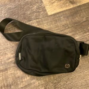 Lululemon Everywhere Belt Bag in black.